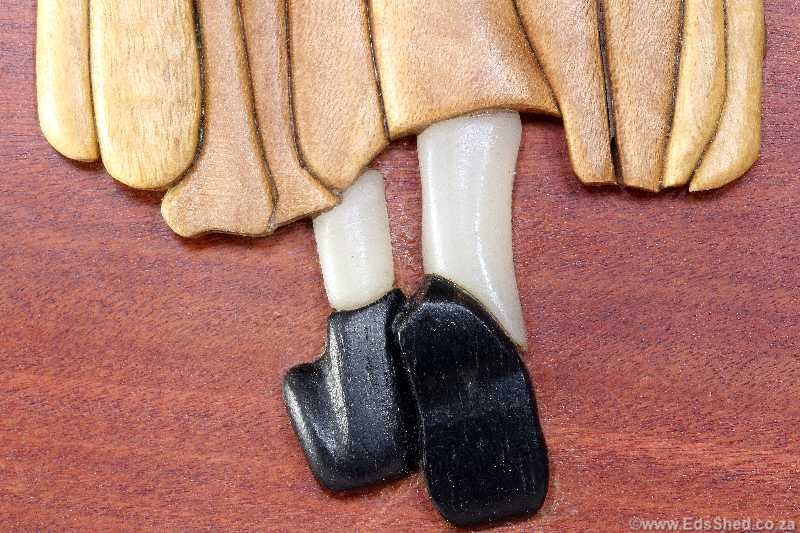 Detail - African Blackwood shoes. Ilala Palm legs.